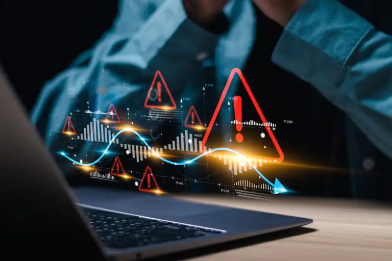 Visuell representation av digitala misstag med varningssymboler och statistik framför en dator